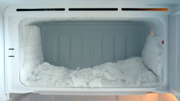 A close-up of freezer frost buildup